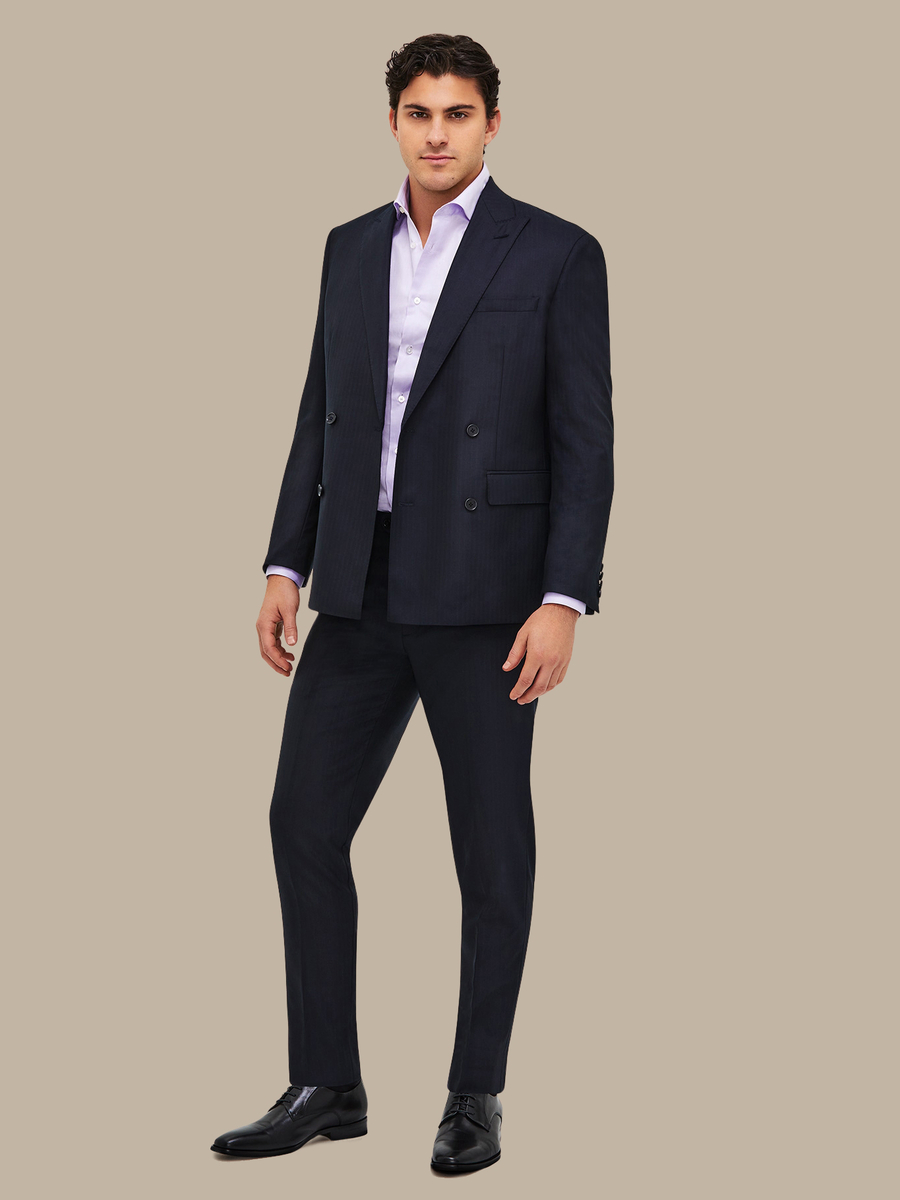 The Navy Herringbone Suit — garment photograph