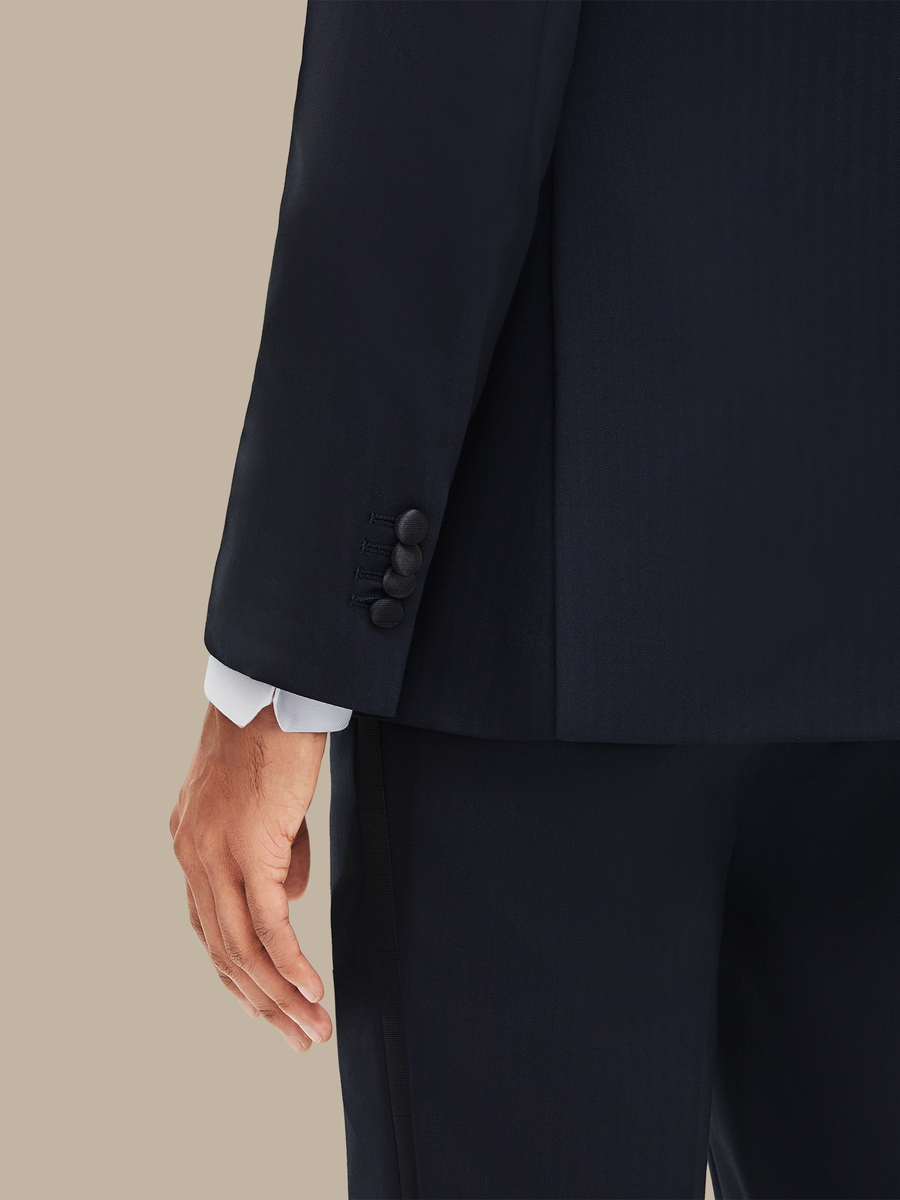 The Navy Herringbone Three-Piece Tuxedo — garment photograph