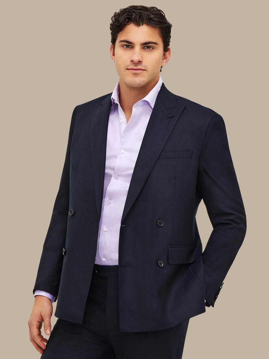 The Navy Herringbone Suit — garment photograph