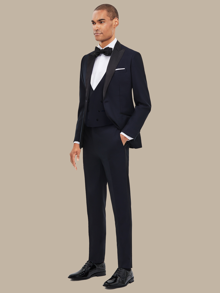 The Navy Herringbone Three-Piece Tuxedo — garment photograph