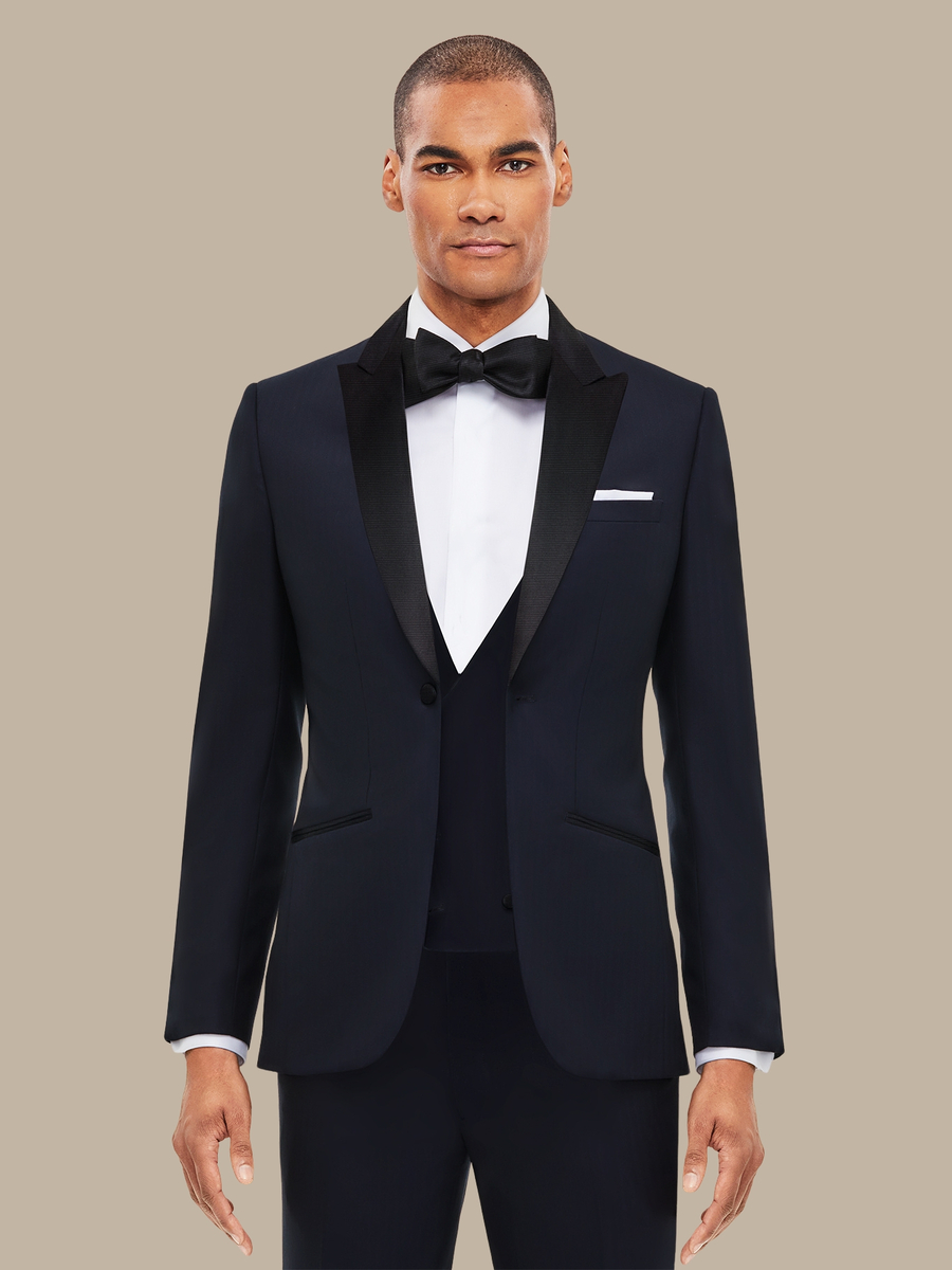 The Navy Herringbone Three-Piece Tuxedo — garment photograph