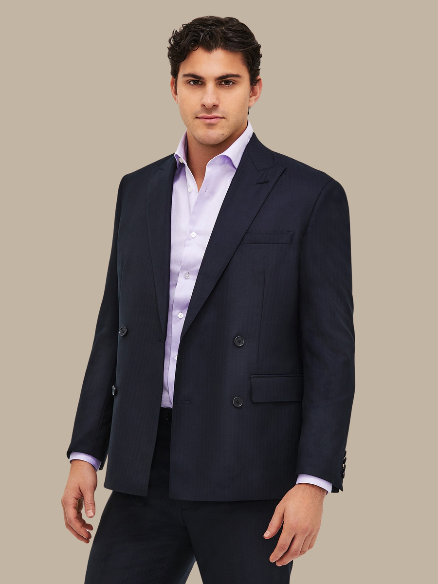 The Navy Herringbone Suit — garment photograph
