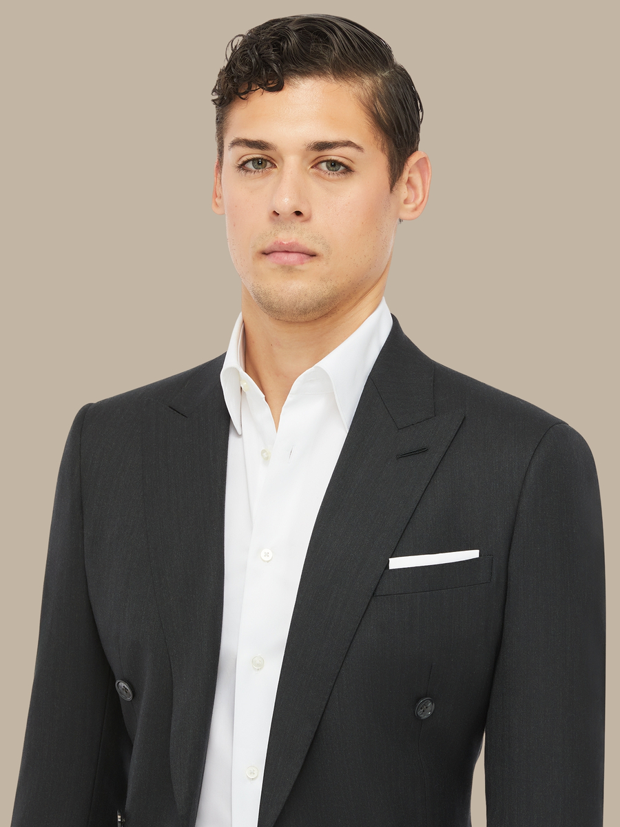 The Charcoal Herringbone Jacket — garment photograph