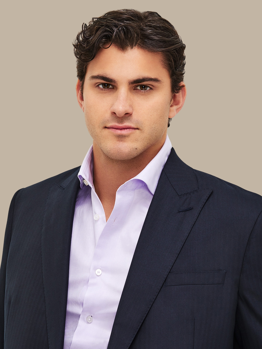 The Navy Herringbone Suit — garment photograph