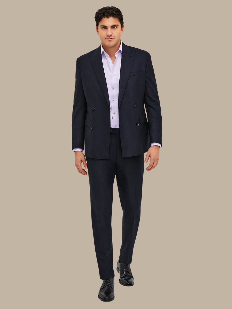 The Navy Herringbone Trousers — garment photograph