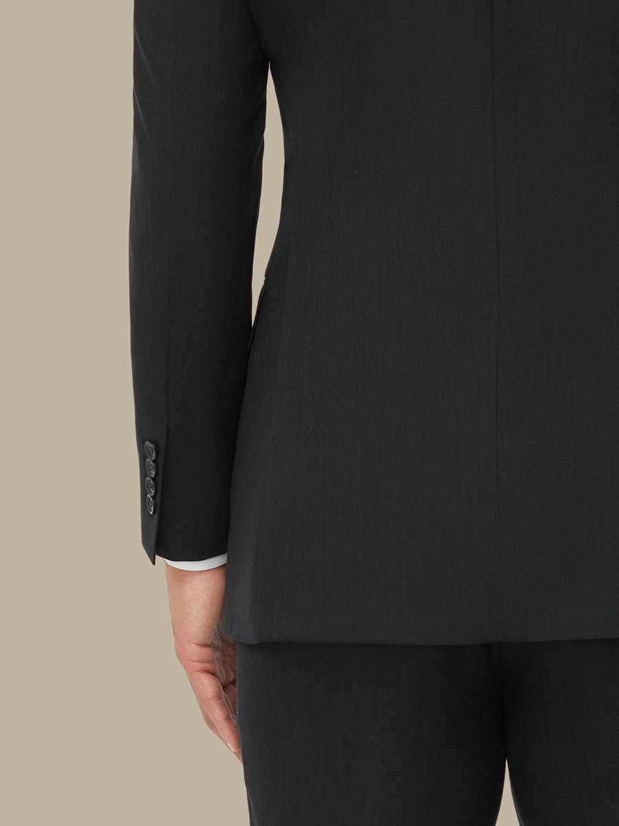 The Charcoal Herringbone Jacket — garment photograph