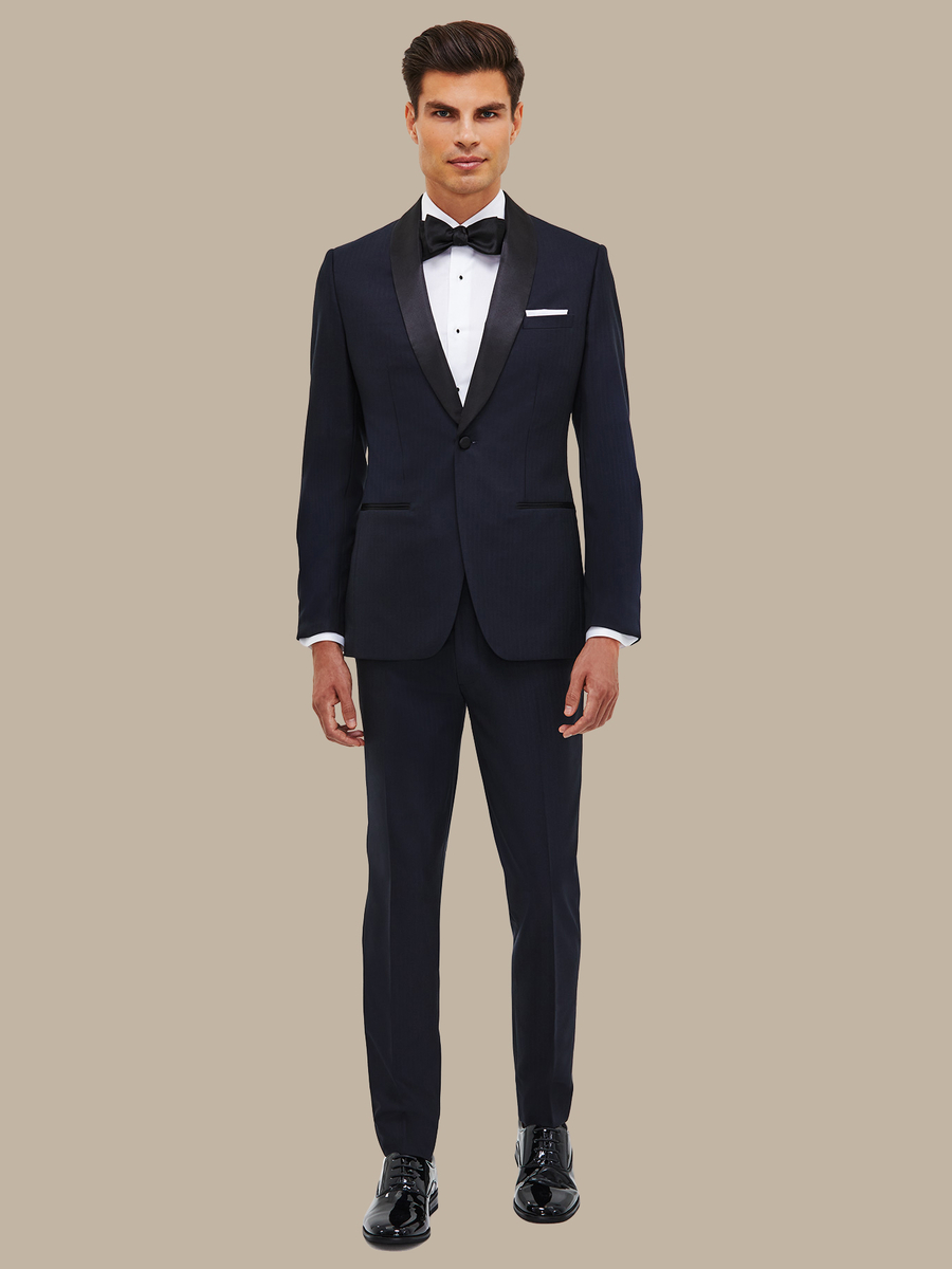 The Navy Herringbone Tuxedo — garment photograph
