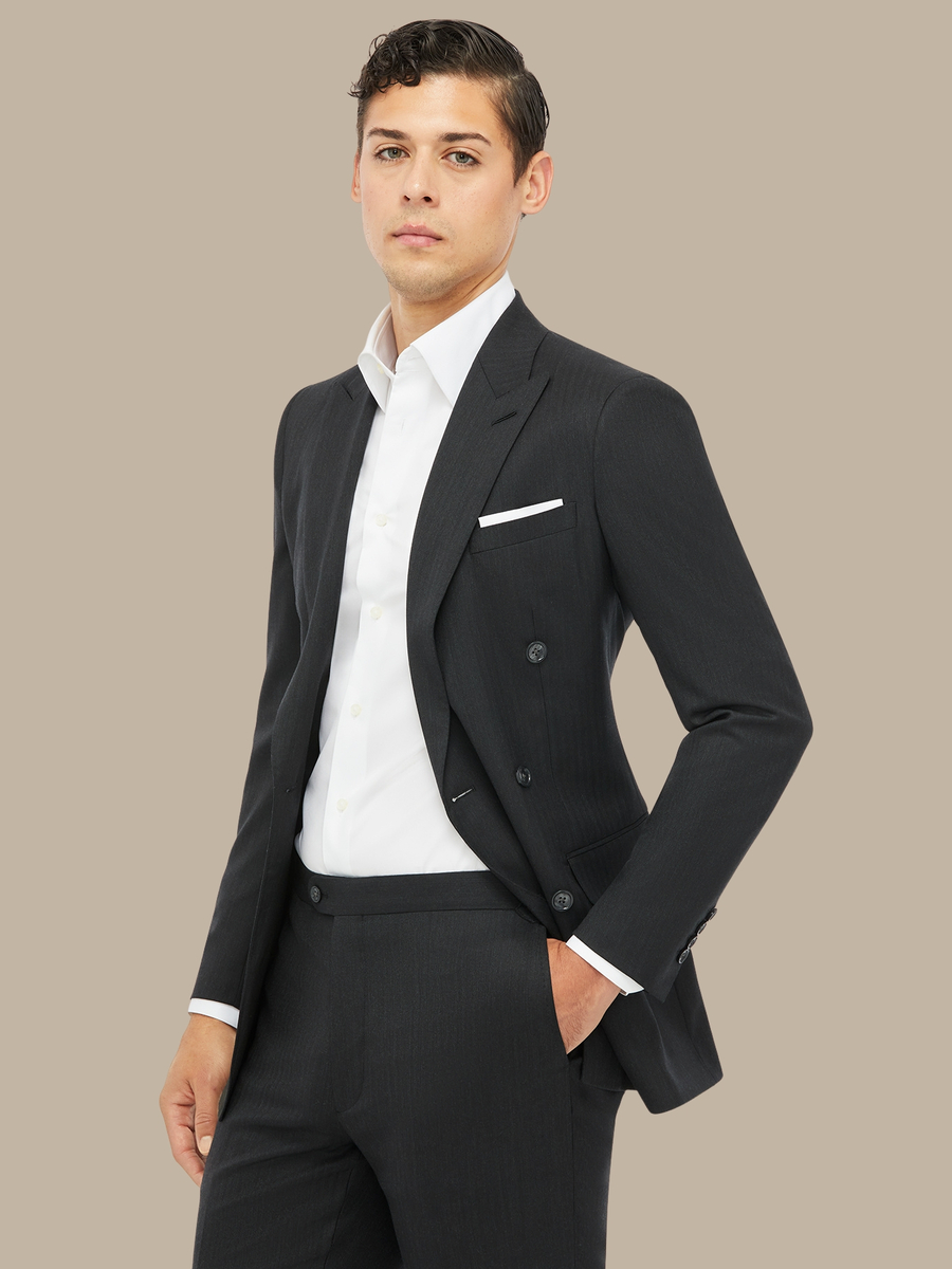 The Charcoal Herringbone Jacket — garment photograph