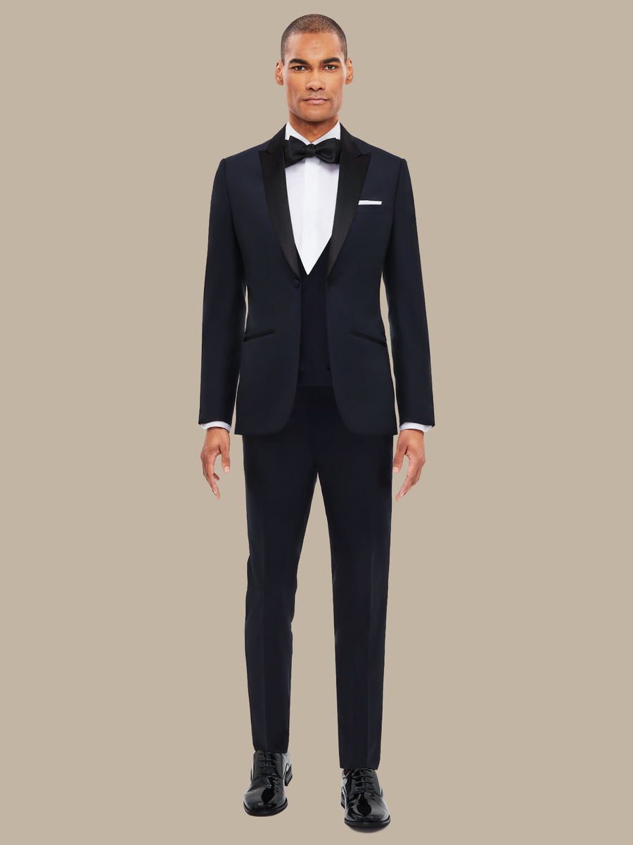 The Navy Herringbone Three-Piece Tuxedo — garment photograph