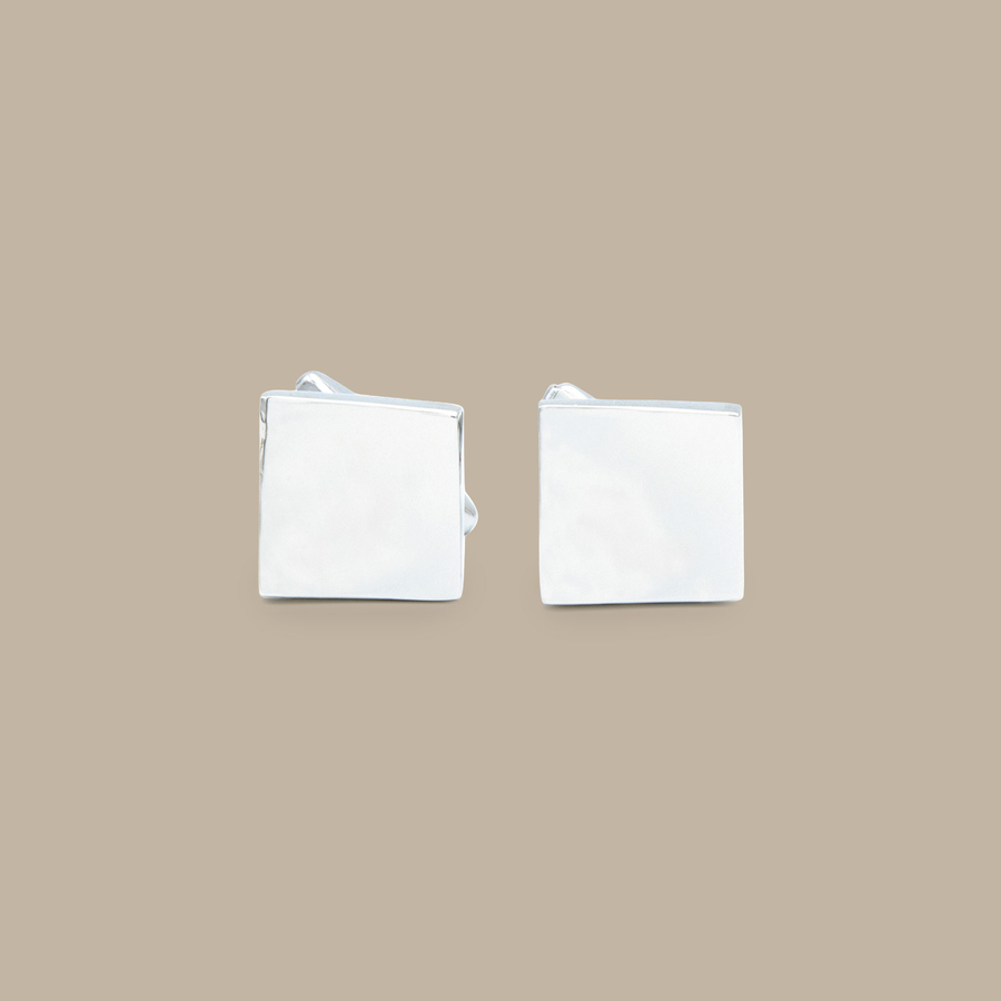Curved Silver Diamond Cuff Links — garment photograph