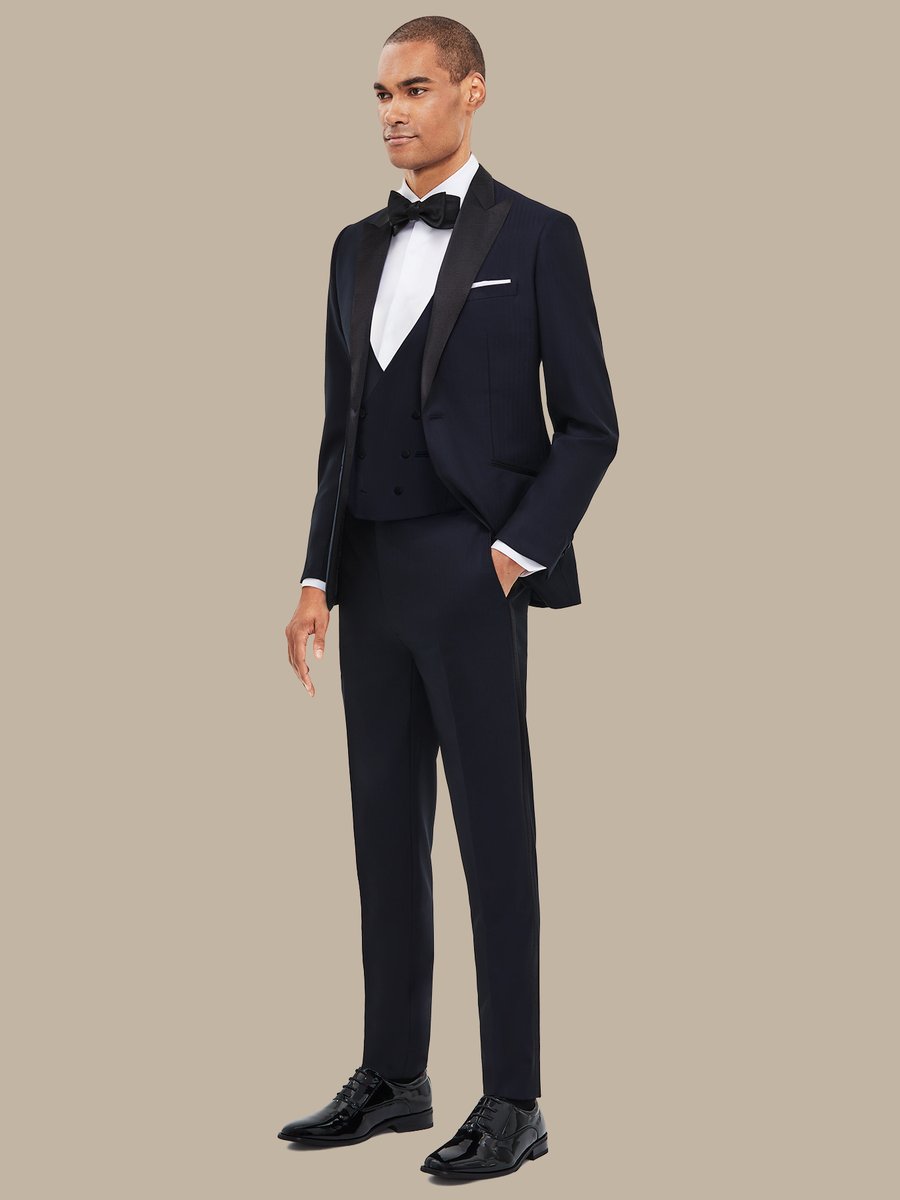 The Dark Navy Herringbone Three-Piece Tuxedo — garment photograph