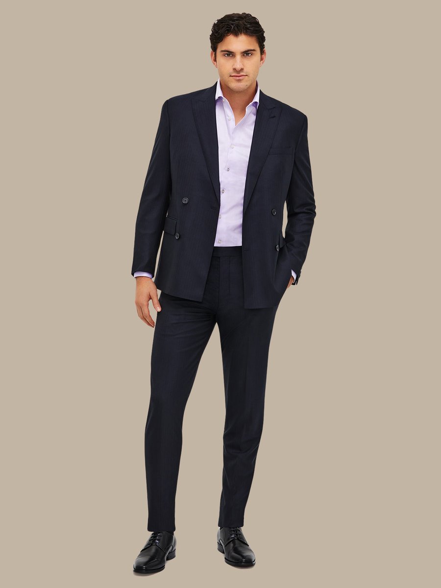 The Navy Herringbone Trousers — garment photograph