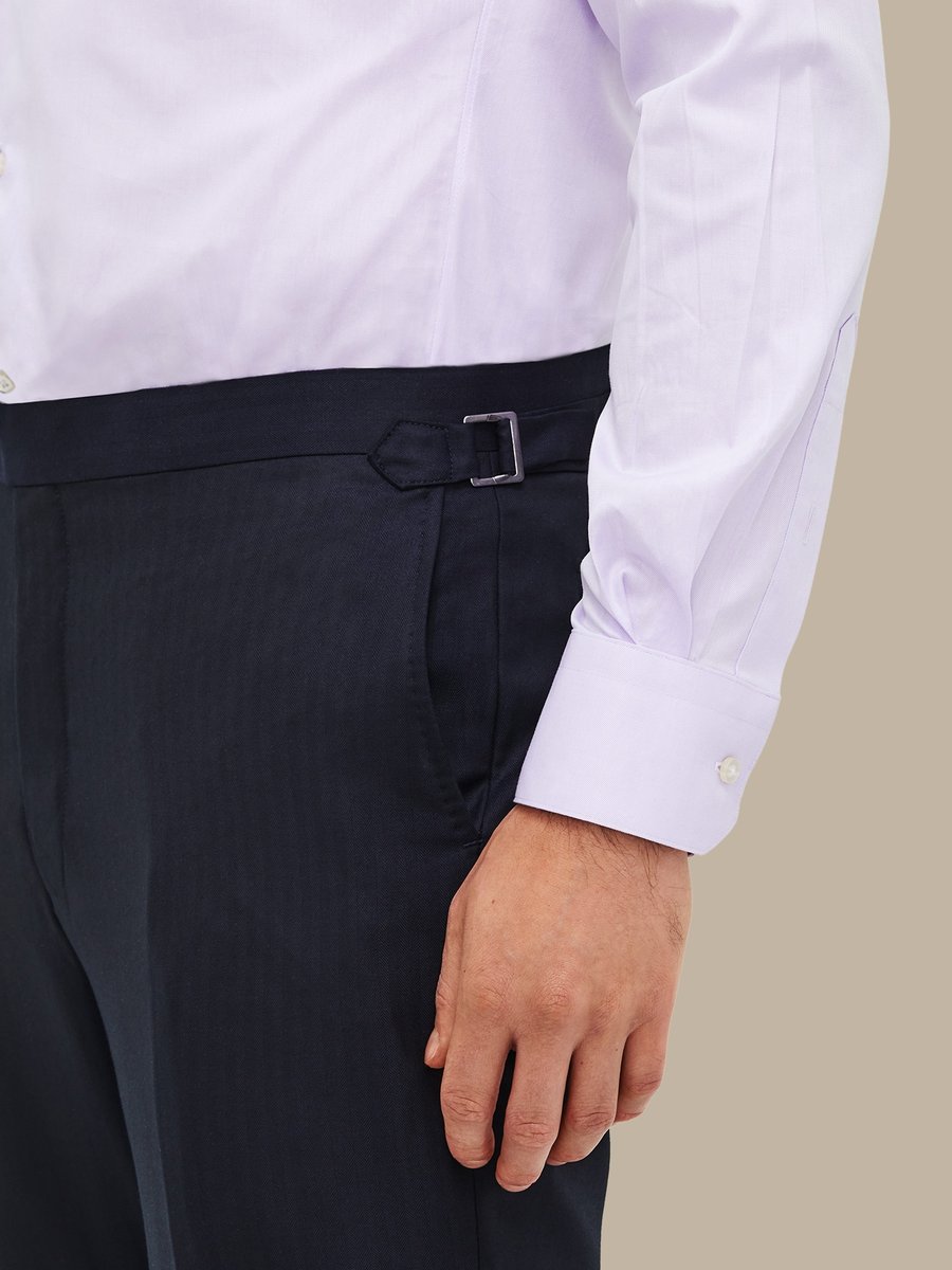 The Navy Herringbone Trousers — garment photograph