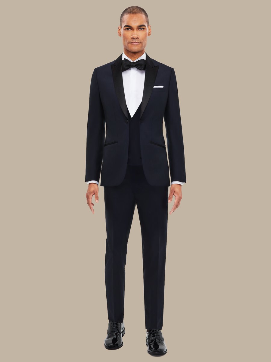 The Dark Navy Herringbone Three-Piece Tuxedo — garment photograph