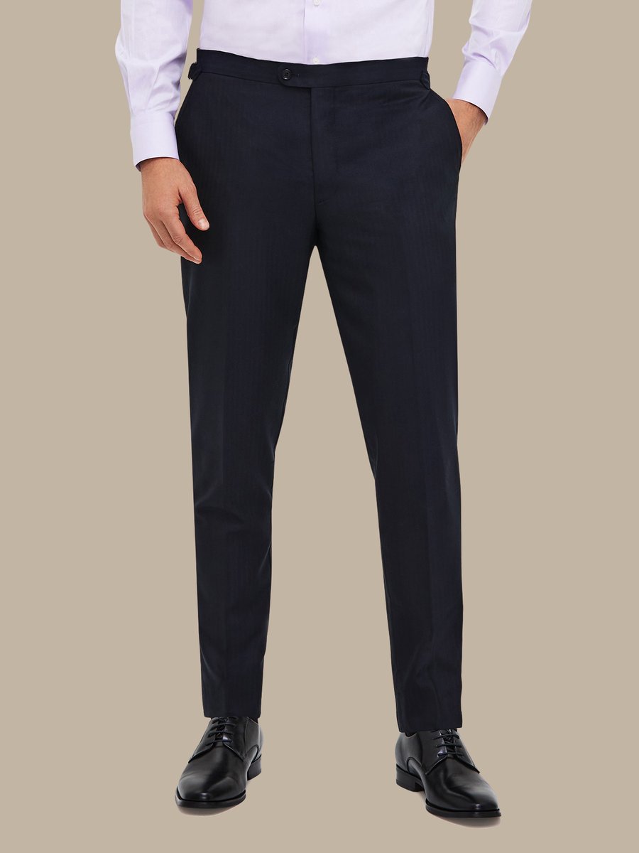 The Navy Herringbone Trousers — garment photograph