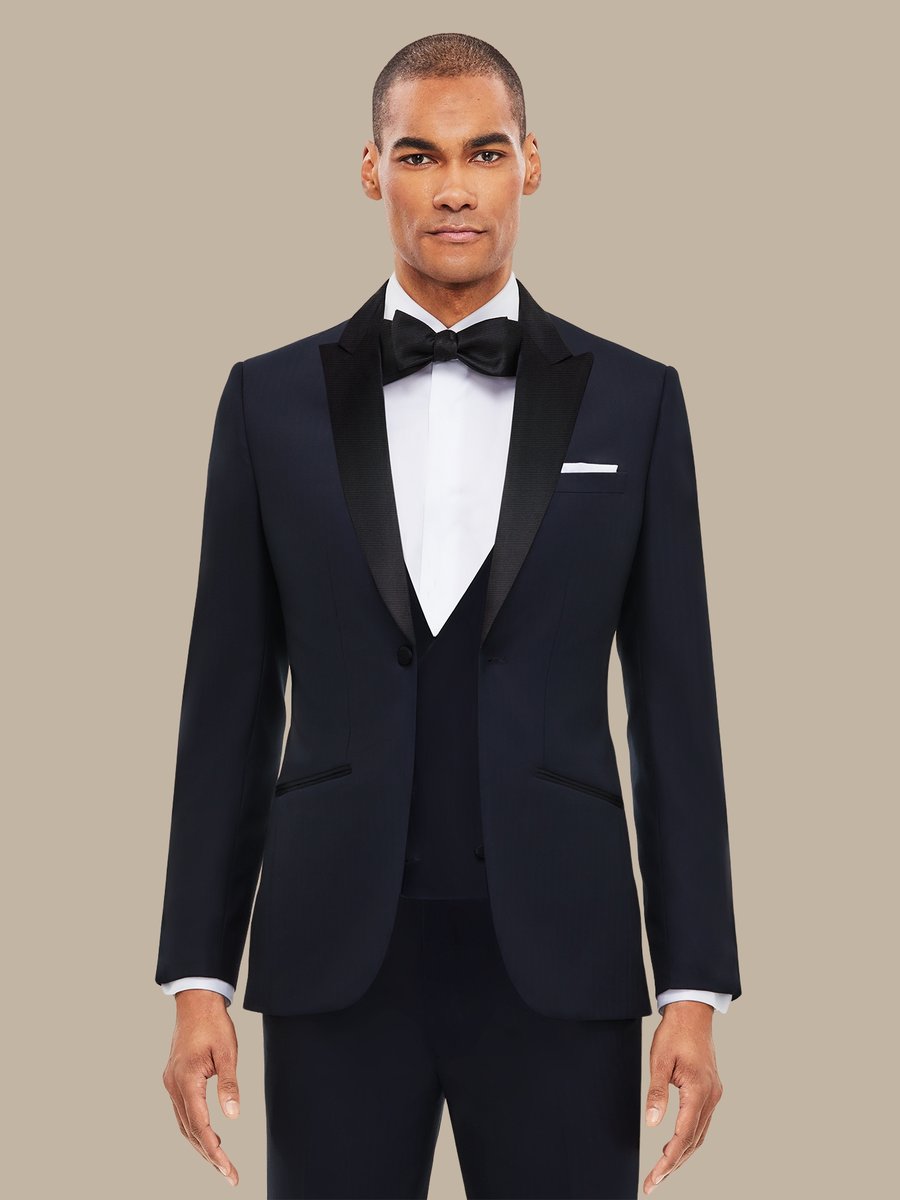 The Dark Navy Herringbone Three-Piece Tuxedo — garment photograph