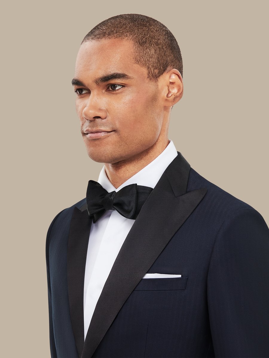 The Dark Navy Herringbone Three-Piece Tuxedo — garment photograph