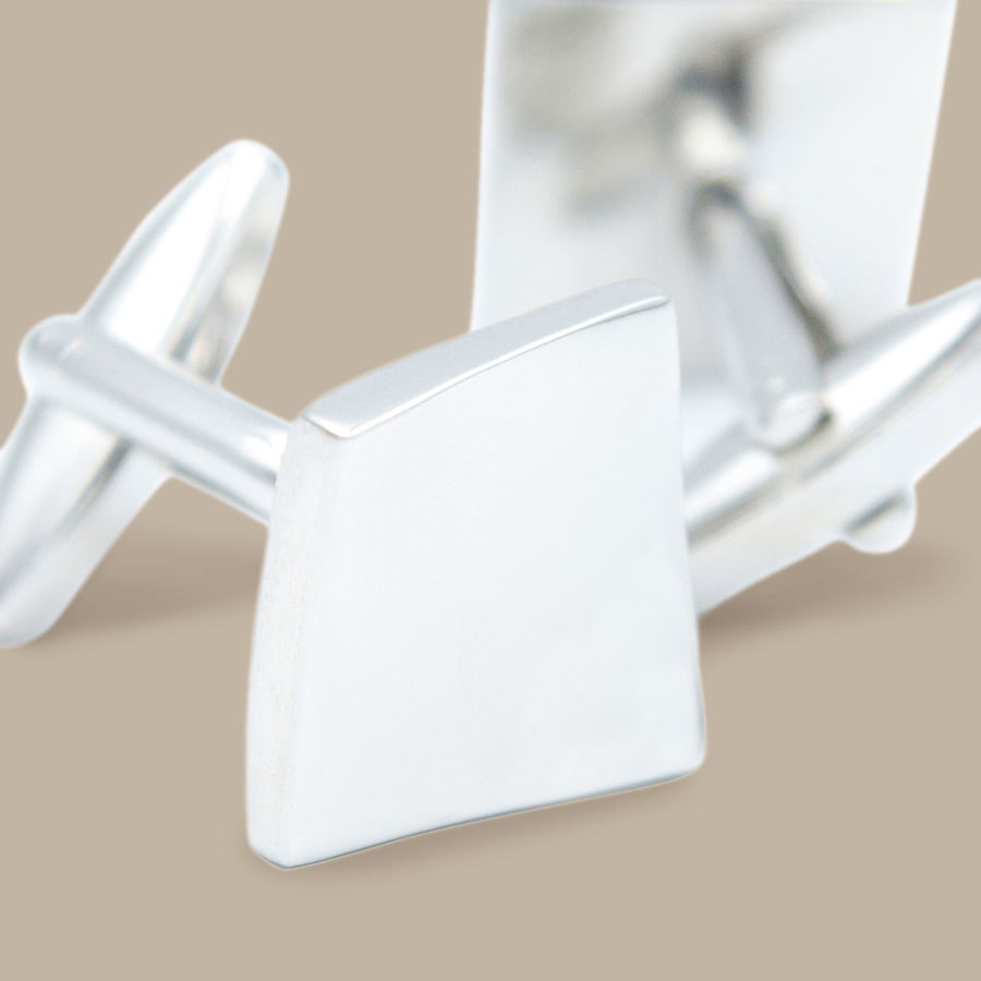 Curved Silver Diamond Cuff Links — garment photograph