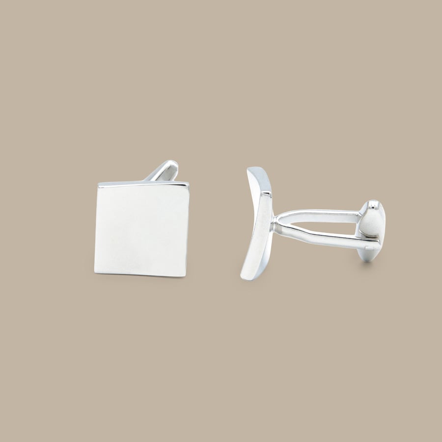 Curved Silver Diamond Cuff Links — garment photograph