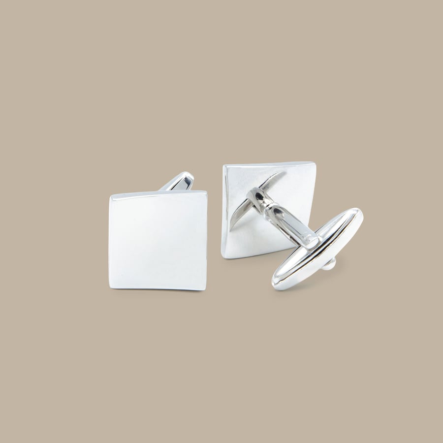 Curved Silver Diamond Cuff Links — garment photograph