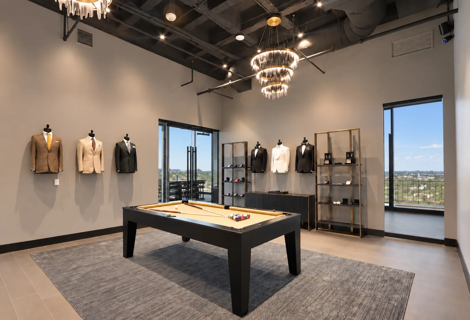 The Enzo Custom Houston showroom, with a pool table, displayed tailoring, and open views